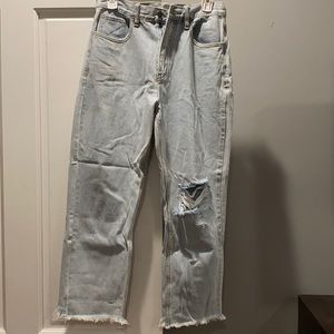 Light wash jeans with frayed hem